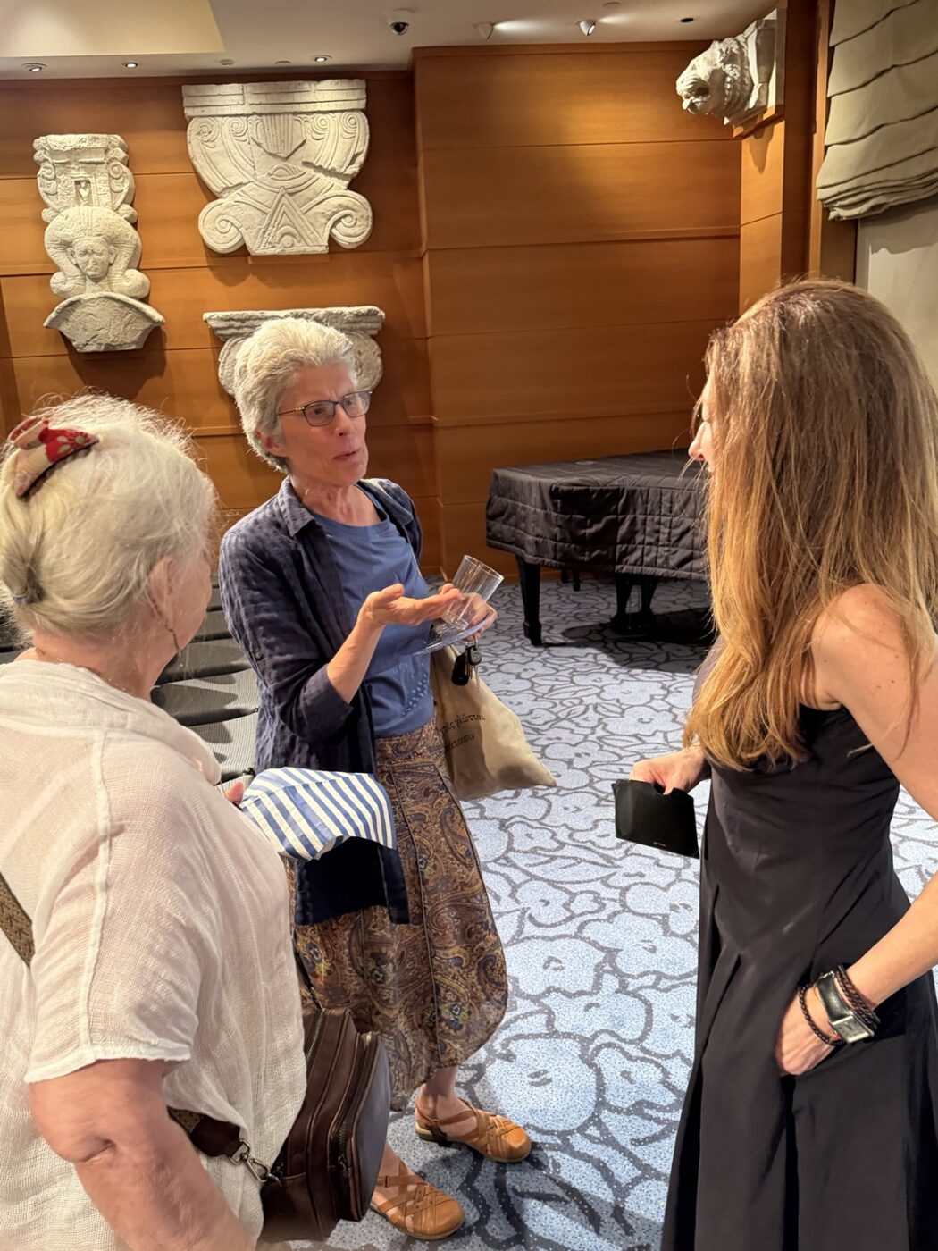Guests in conversation during the Suzi Salon reception.
